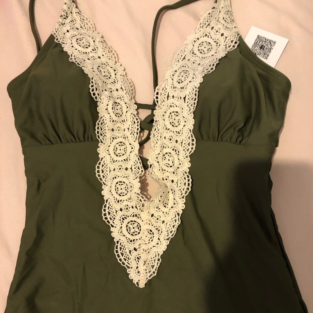 Green one piece swim suit
